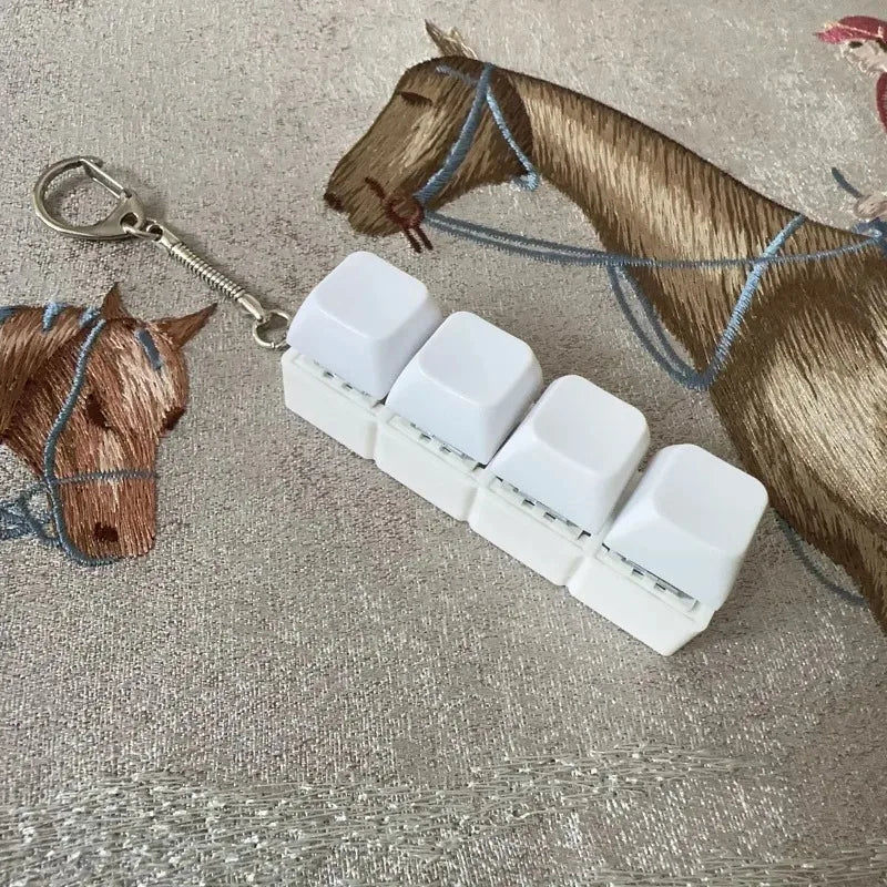 New Stress Anxiety Relief Keyboard Keychain Four Finger Button for Office Home Adults Kid Decompression Clicker Hot Gadget Gifts