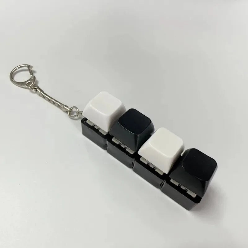 New Stress Anxiety Relief Keyboard Keychain Four Finger Button for Office Home Adults Kid Decompression Clicker Hot Gadget Gifts